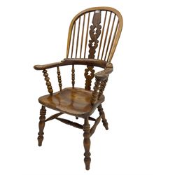 Traditional elm Yorkshire style Windsor armchair, high back with pierced and fret work splat, turned supports joined by double H stretcher