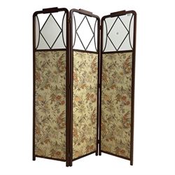 Edwardian inlaid mahogany three-fold screen, the cresting rail carved with linen garland over glazed panel and floral upholstered panel 