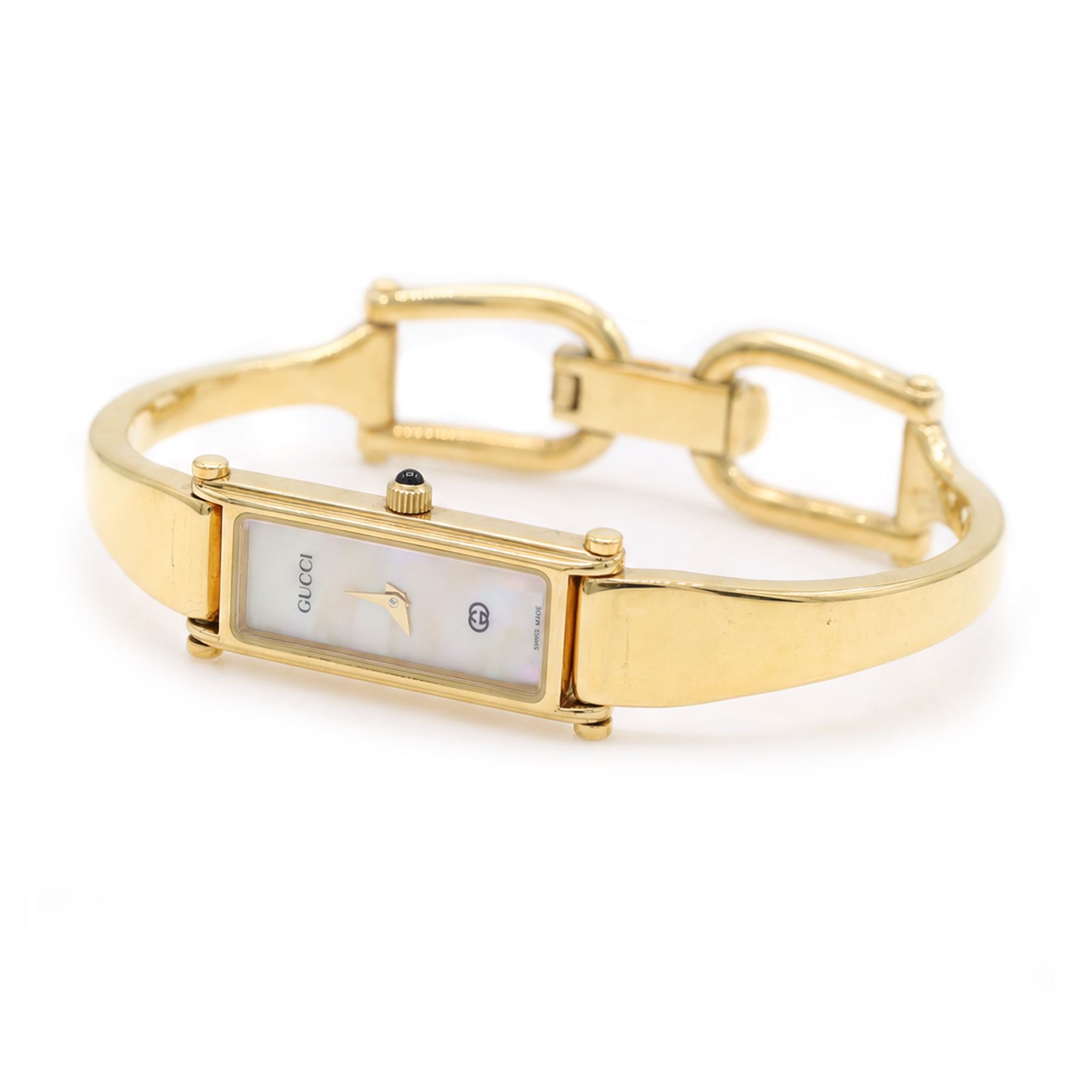 Gucci ladies gilt quartz wristwatch, Ref. 1500, with mother of pearl dial, boxed