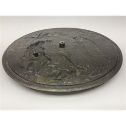 Late 19th century bronze plaque, of circular form, depicting the angel appearing to Adam and Eve in the garden of Eden in high relief, D25.5cm
