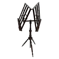 Early 20th century stained beech duet music stand, opposing twin music rests with swivel action, raised on turned column with bobbin turned tripod base