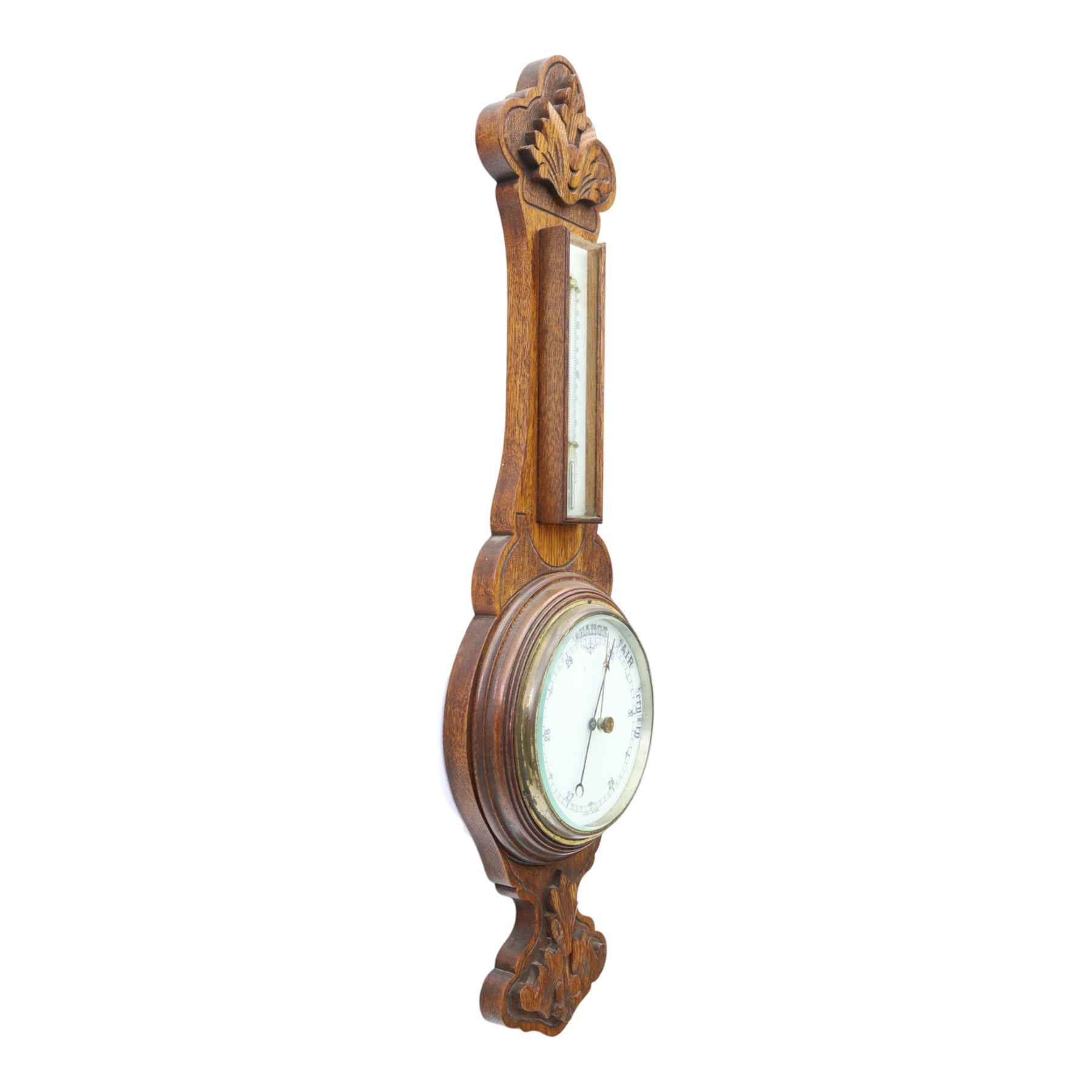Late Victorian carved oak aneroid barometer, the foliate crest above a glazed thermometer and circular dial, with further carved decoration below, H 75cm