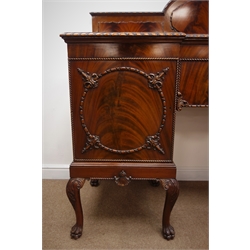  Early 20th century figured mahogany inverted break front sideboard, raised and carved back with gadroon carved detail, two cupboards with centre drawer, scroll carved cabriole legs with paw feet, W184, H158cm, D62cm  