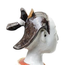 Large Japanese Imari porcelain figure, modelled as a Bijin, wearing a long kimono decorated with apple blossom and leafy branches on a white ground, with gilt detailing, possibly Edo period, H63cm