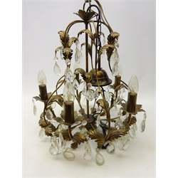  Two tier bronzed metal chandelier with faceted glass drops, H51cm excluding chain, Rococo style gilt metal two branch wall sconce, five other wall sconces and a Japanese 'Rochamp' pottery table lamp decorated with Peach Blossom (8)  
