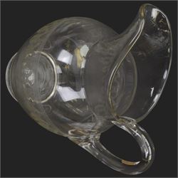 Edwardian glass wash jug and bowl, each engraved with looping border, jug H31.5cm, bowl D39.5cm