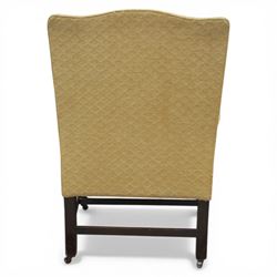 20th century Gainsborough style open armchair, upholstered in patterned fabric, the chair with shaped padded back and scroll arms on moulded frame