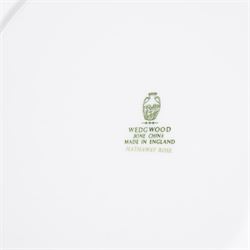 Wedgwood Hathaway Rose pattern tea and dinner wares, comprising two covered tureens, two oval serving dishes, eight dinner plates, eight dessert plates,  six side plates, eight soup bowls and stands, four teacups and saucers, and a sauce boat and stand