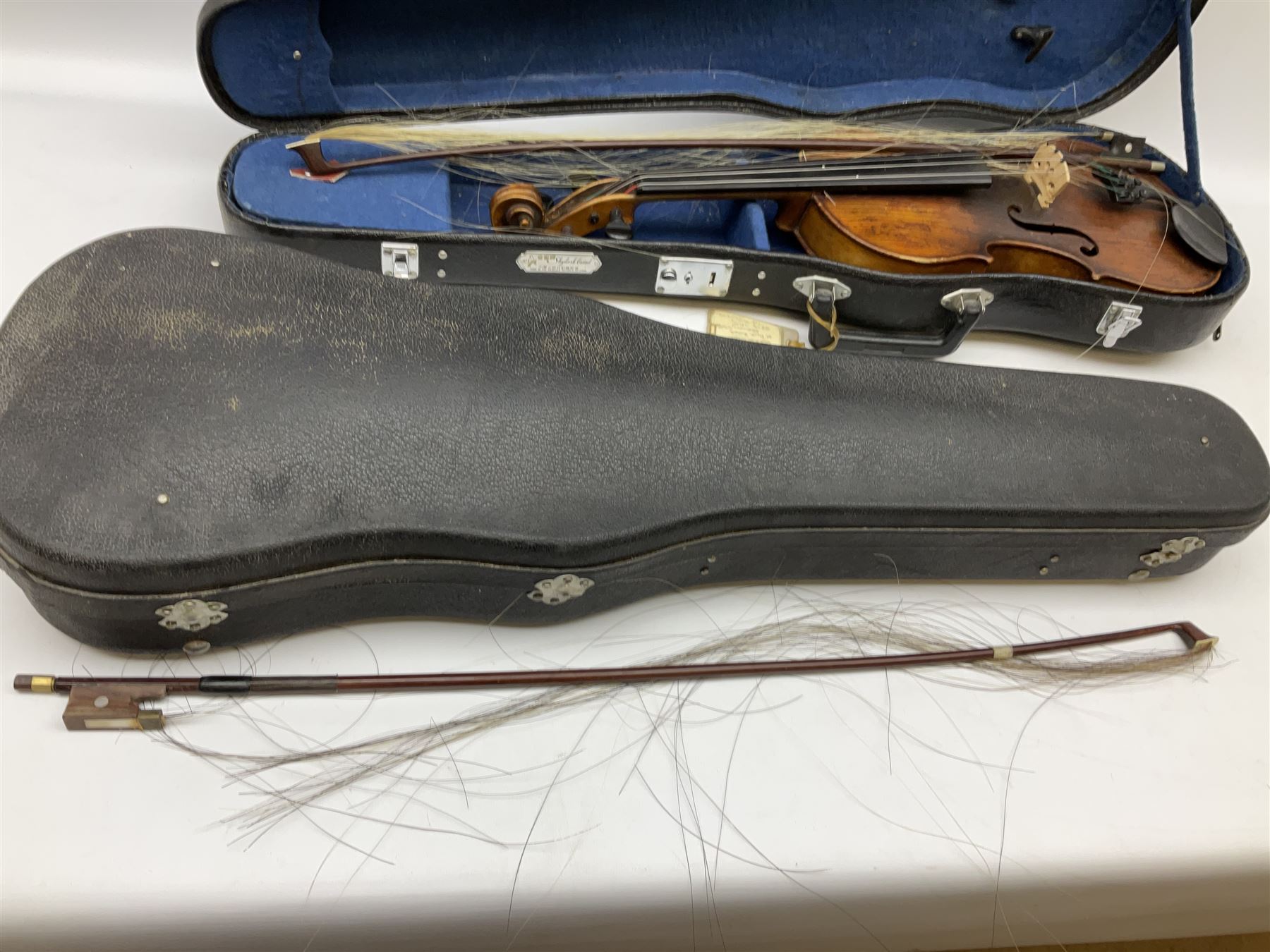 Two cased Skylark violins with bows, largest violin L59cm 
