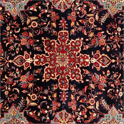 Two hand-knotted rugs, comprising Persian floral rug, dark blue ground decorated with scrolling foliage and flowerheads within a red floral border (H 208cm, W 134cm); Bokhara type rug, red ground with repeating gul motifs and geometric guard borders (H 174cm, W 94cm)