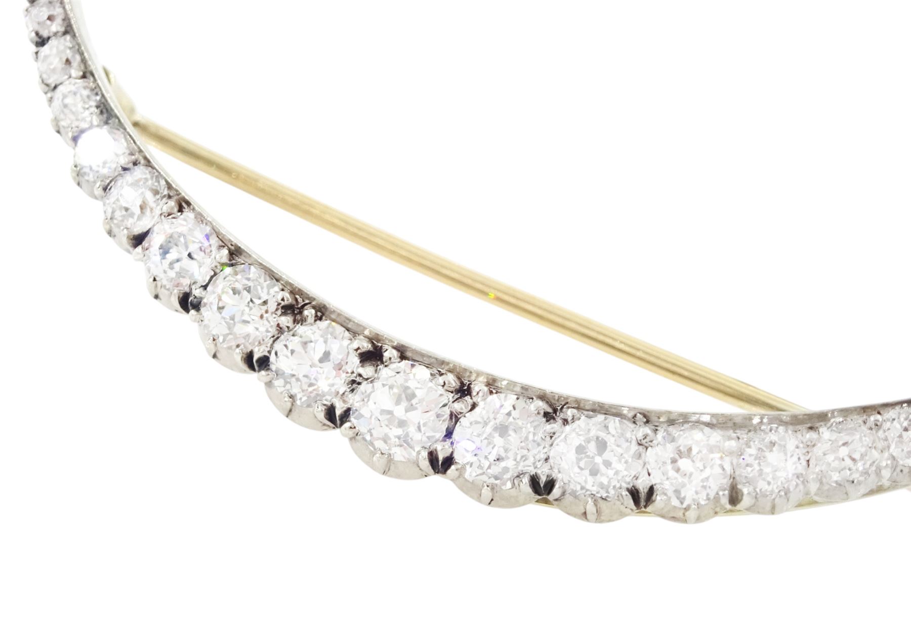 19th century silver and gold diamond crescent moon brooch, set with twenty-one graduating old cut diamonds and six rose cut diamonds, total diamond weight approx 2.00 carat