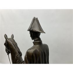 Large and impressive bronze figure of Wellington seated on a horse, on a sarcophogus shaped stepped base impressed 'Meunier Paris', the canted corners inset with battle trophies H68cm L50cm D22cm