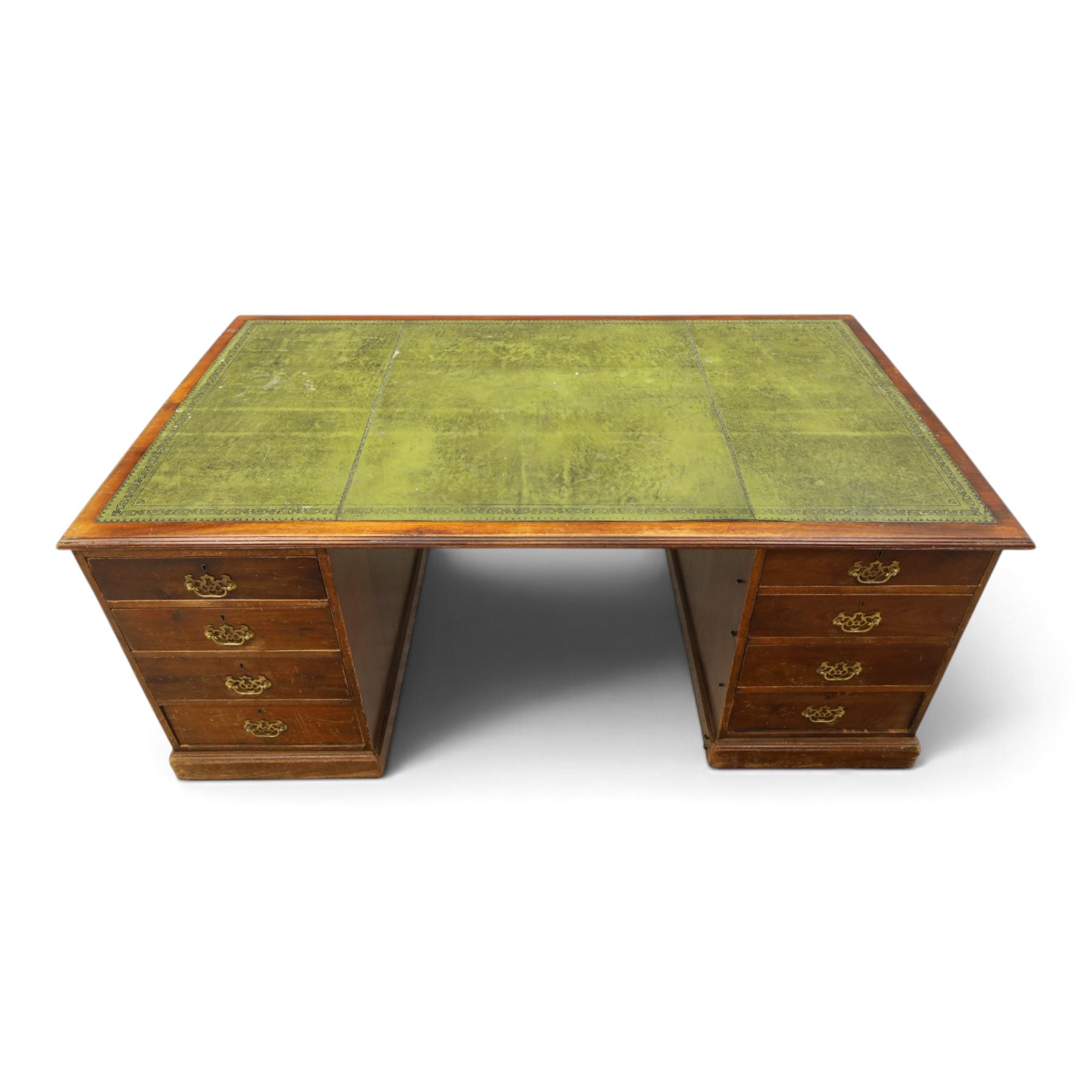 Edwardian mahogany office desk, recatangular top with green inset leather writing surface, fitted with two banks of four drawers, brass swan neck handles with ornate backplates