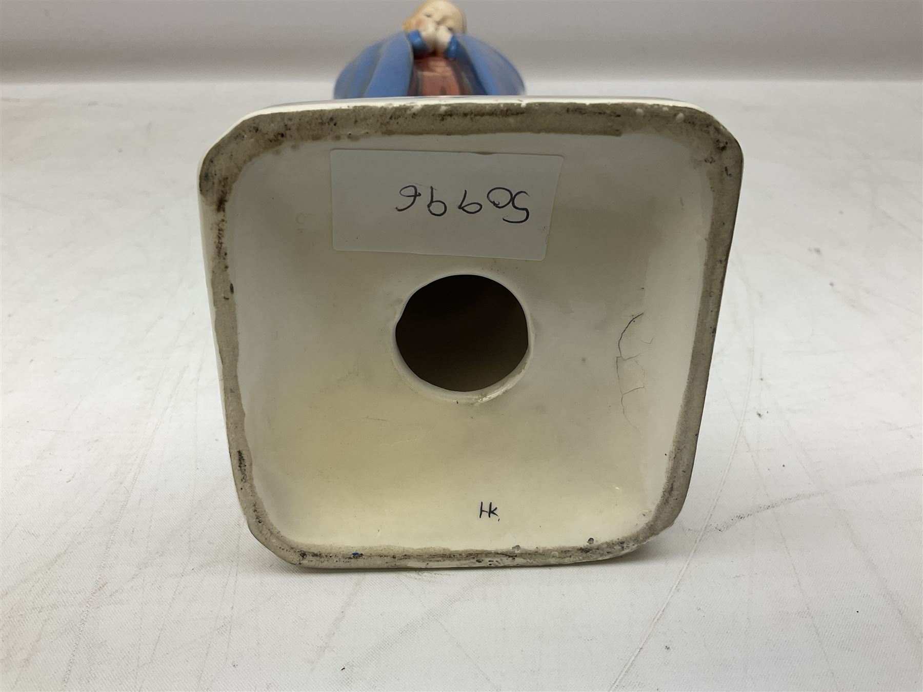 Hummel figure of a praying Saint together with a figure of a seated girl with deer, largest H40cm (2)