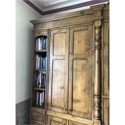  Bespoke figured oak freestanding bookcase/display cupboard, fitted with multiple paneled doors, fall front compartment and glazed display doors (H270cm, W380cm, D60cm) By repute purchased from Harrods circa 2000. Situated at a property in North Leeds. Viewing by appointment only, please contact William Duggleby for further information on 01723 507111.   