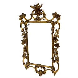 Oval mirror in gilt frame, oak framed mirror with bevelled plate, Art Nouveau design mirror with figure, floral framed mirror with oval bevelled plate and another mirror (4)