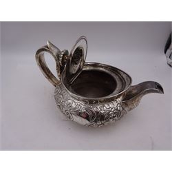 George III Irish silver teapot, of squat circular form, the body with repousse and chased floral and C scroll decoration, with capped C handle and ivory insulators, engraved to base 'Presented to Troop Sergeant Major John Percival, of the 4th Dragoon Guards by Alex D. Tait, Esq, late Captain in that corps as a mark of approbation of his steady and upright conduct when Sergeant Major of his Troop, Dublin, June 2nd 1843', hallmarked William Law, Dublin 1817, H12.5cm, This item has been registered for sale under Section 10 of the APHA Ivory Act
