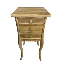 Hardwood bedside lamp table, shaped rectangular top over three drawers, canted uprights with carved floral pattern, shaped apron, raised on cabriole supports
