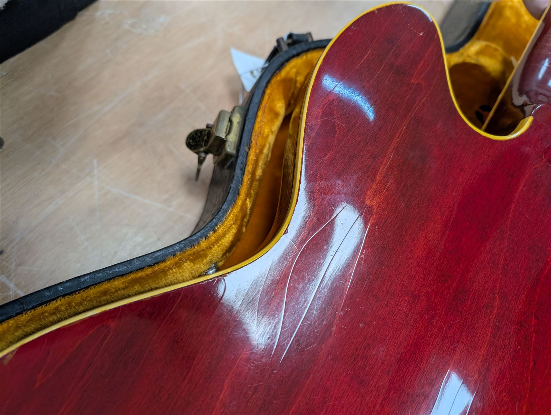1967 Gibson ES-335 TDC electric guitar, in cherry red finish, made in USA, semi-hollow body, mother of pearl fret markers, original pick guard, original tuning pegs, contained within period hard case made in Philadelphia USA with orange velvet lining, guitar length L104cm