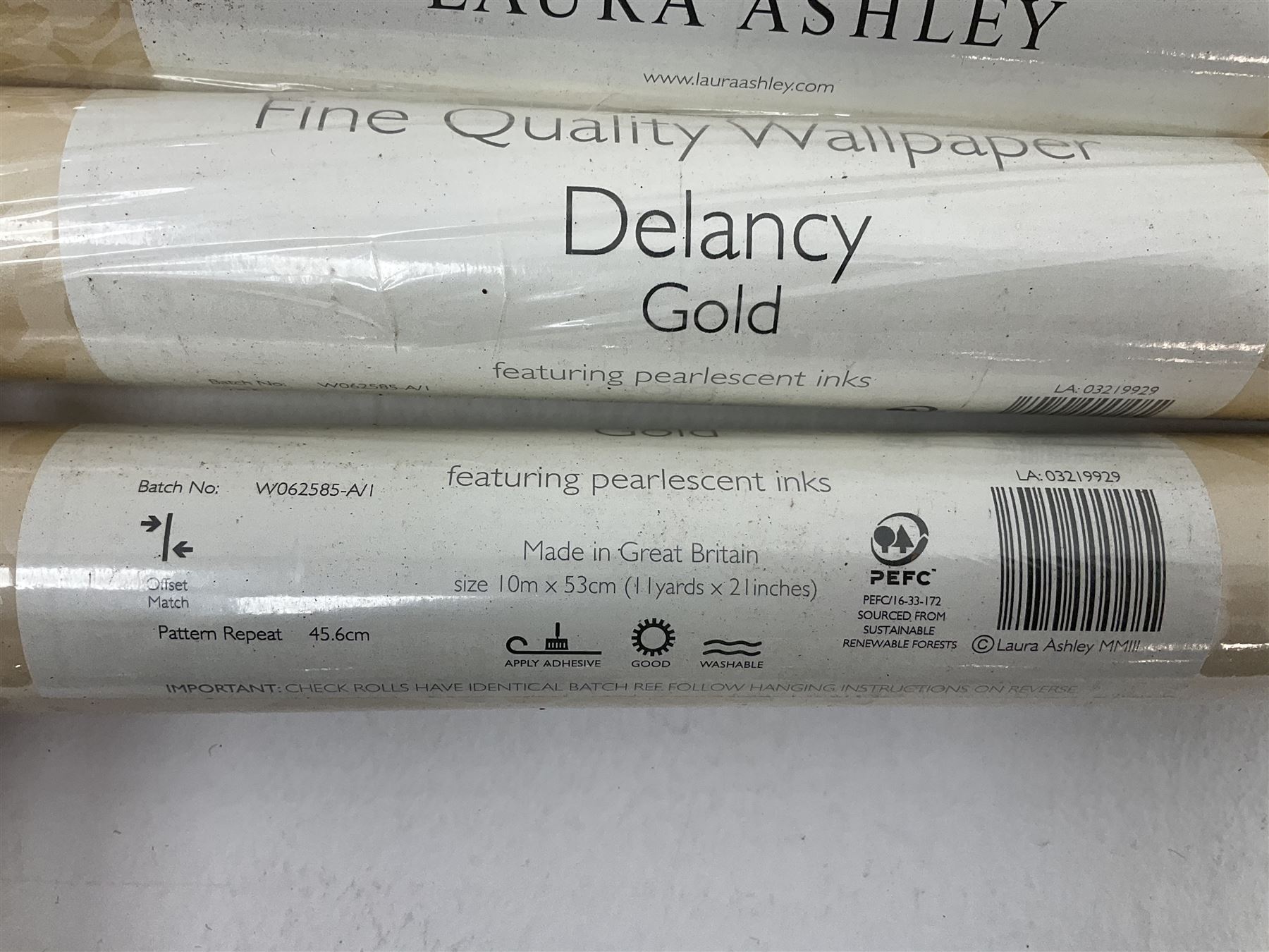 Seven rolls of Laura Ashley Delaney Gold wallpaper (W10m, W53cm)