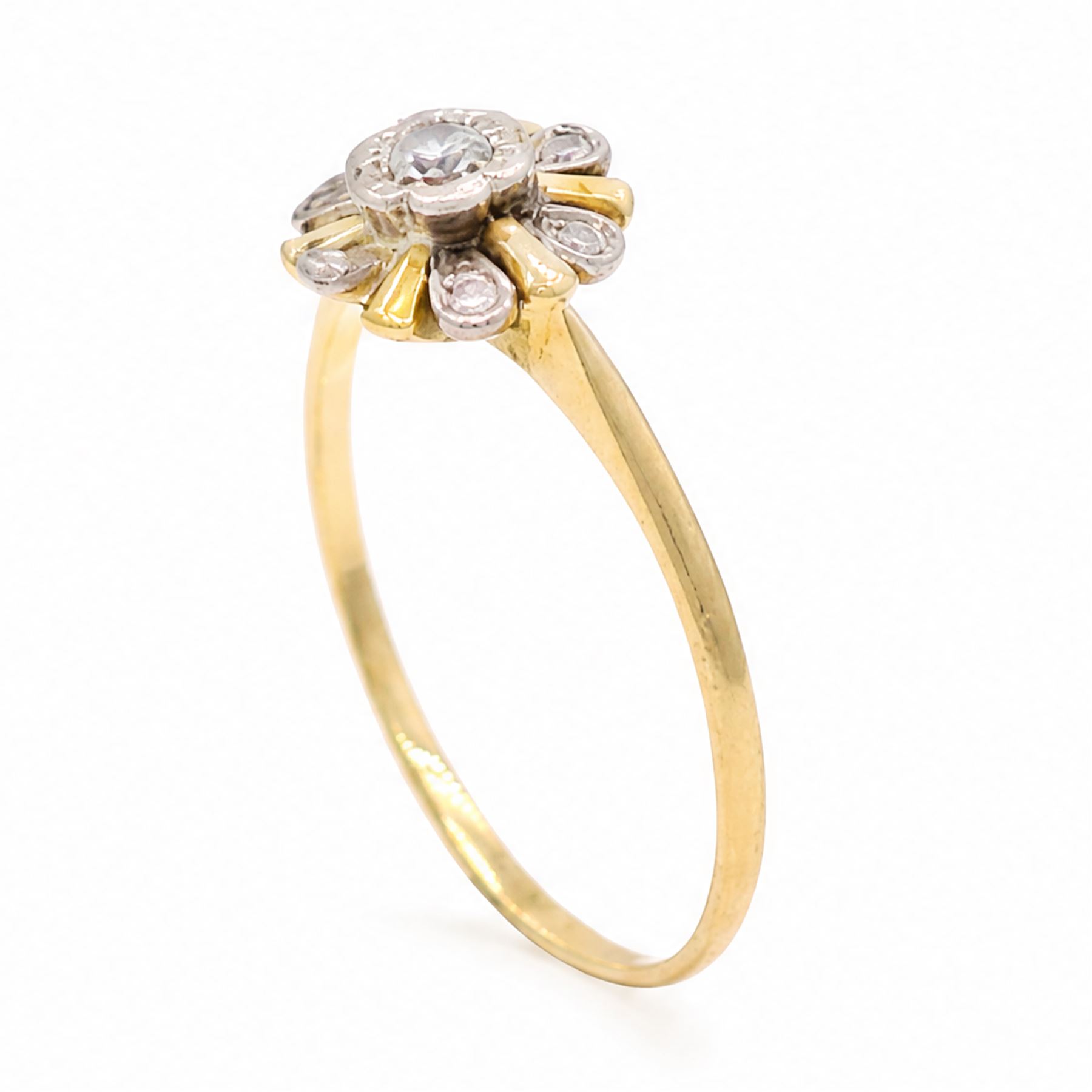 18ct gold diamond flower head cluster ring, round brilliant cut diamond surrounded by six single cut diamonds 