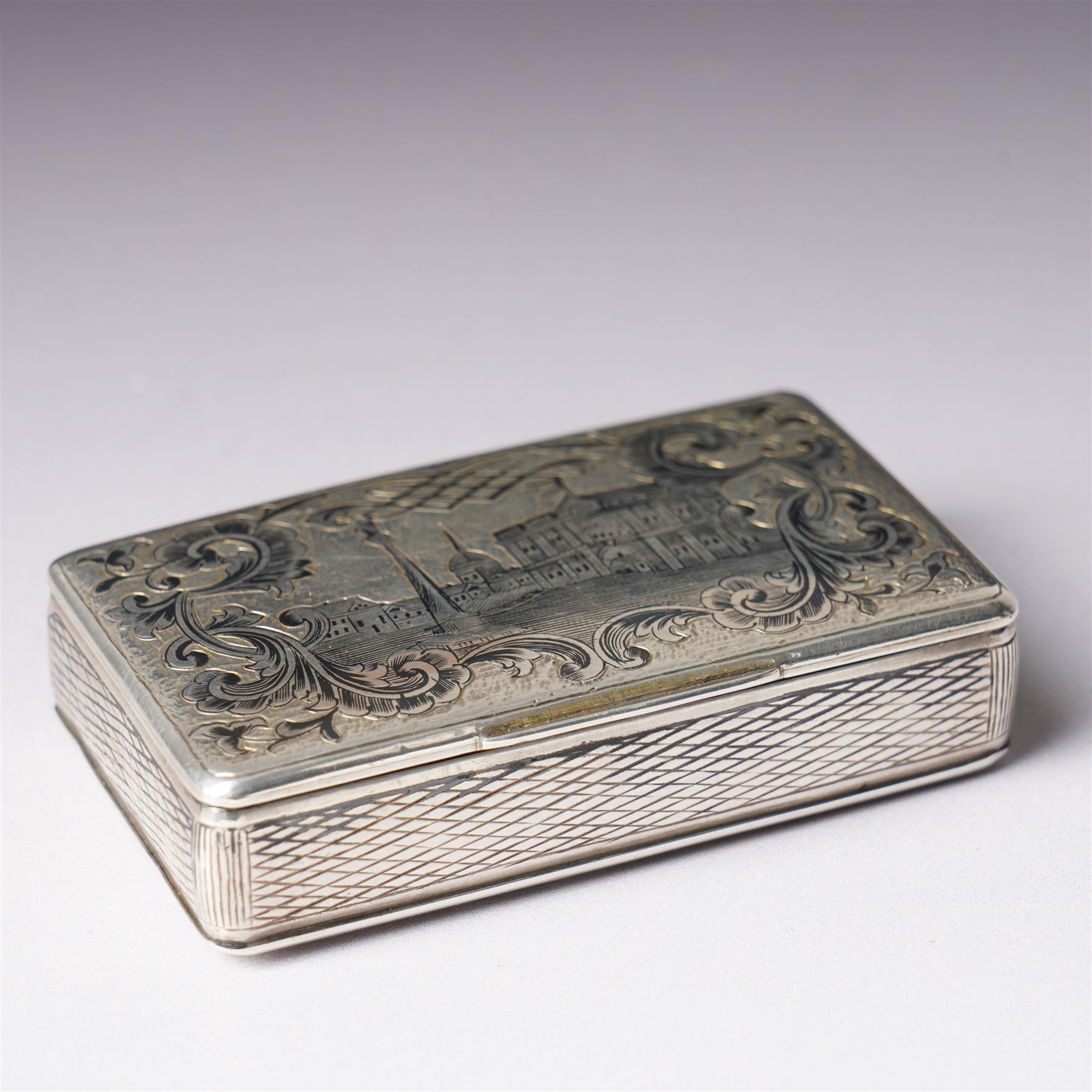 19th century Russian silver and niello work snuff box engraved with a view possibly of St Petersburg, Moscow assay, 84 standard