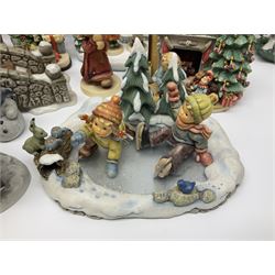 Large collection of Christmas themed Hummel figures and Hummel scapes by Goebel, to include Winter Friend, Making New Friends, Tree Trimming Time, Winter Adventure etc