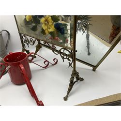 Two mirrored brass fire screens, together with two christmas tree stands and two galvanised watering cans one with a rose head