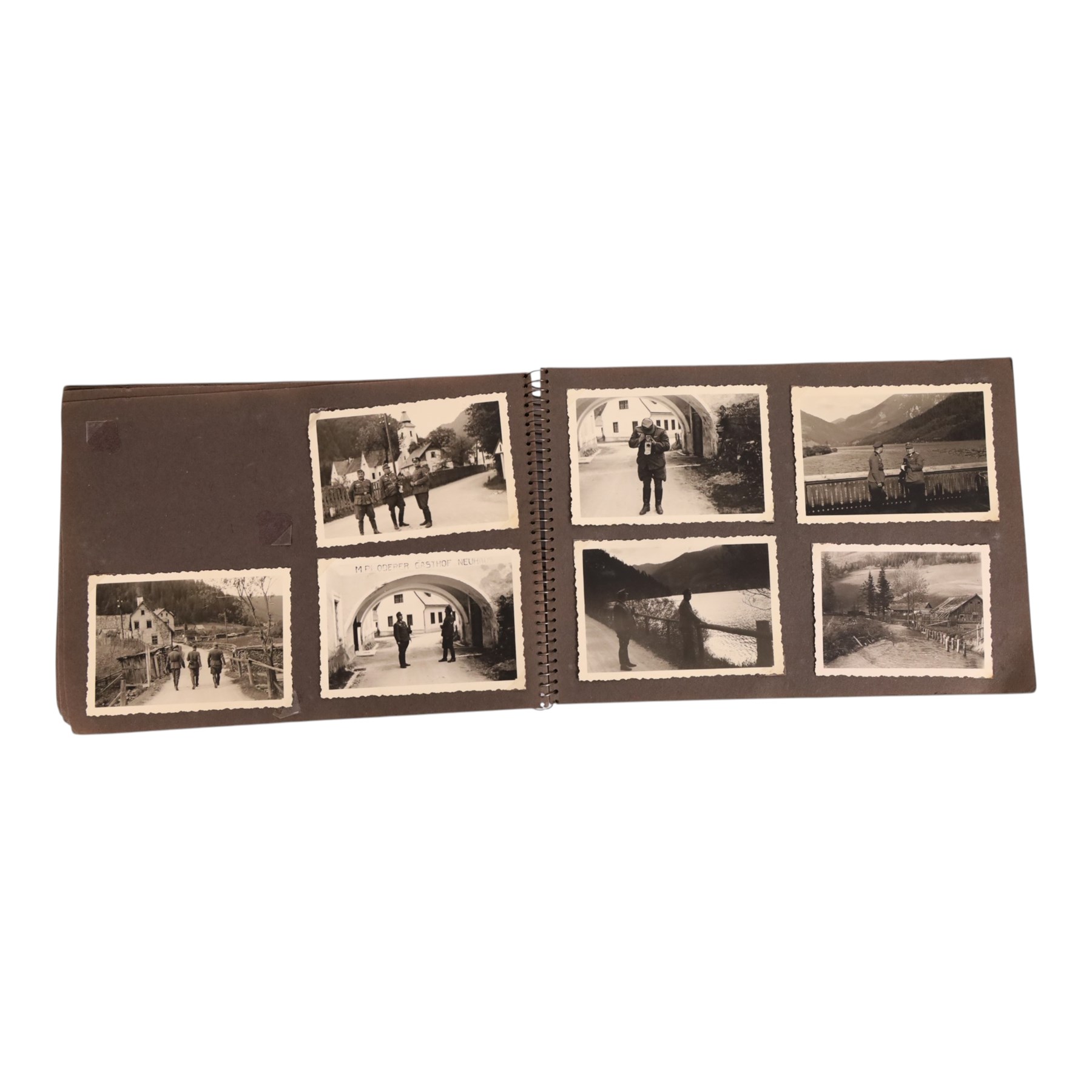 WWII German Soldiers photo album, 1942, including photographs of soldiers in uniform posing during parade etc  