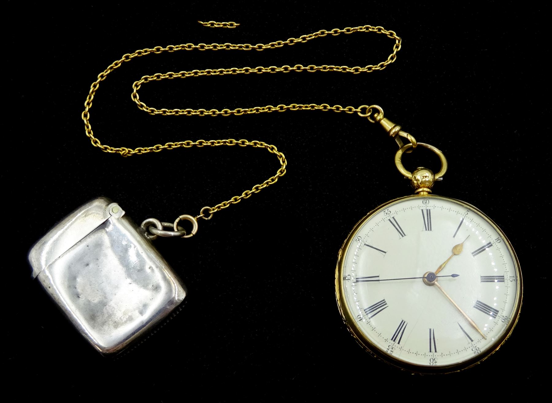 Victorian 18ct gold open face English lever fusee pocket watch by Frisch & Schierwater, Liverpool, No. 14789, cream dial with Roman numerals and outer Arabic minute ring, the back case with engraved decoration depicting a village scene, case by Christopher Jones, Chester 1843, on gold chain with silver vesta case by A & J Zimmerman Ltd