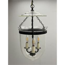 Vaughan Designs - Regency design bronzed metal and glass hall lantern, three branch light in glass bell, the band decorated with bell flower garlands and serpentine mythical beast chain brackets