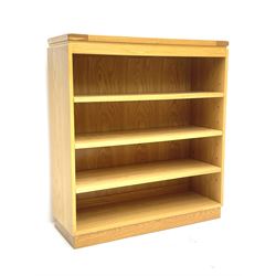 Solid light oak open bookcase fitted with three adjustable shelves