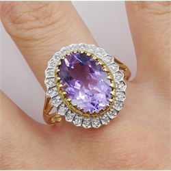 9ct gold oval amethyst and diamond cluster ring, hallmarked
