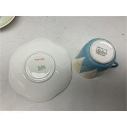 Shelley Dainty pattern tea wares, of lobed form with blue star decoration on merging white and yellow ground, comprising five teacups, five saucers, six tea plates, milk jug and cake plate, all with printed green mark beneath, some with painted pattern no 11770