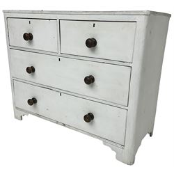 19th century white painted chest, reeded moulded edge over two short and two long drawers, on shaped bracket feet