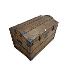 Late 19th to early 20th century oak framed travelling trunk, dome top with iron fittings and panelled sides and top, interior labelled 'The Anchor Patent Waterproof Travelling Trunk - 1902'