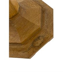 Mouseman - oak standard lamp, octagonal tapered column on octagonal base carved with mouse signature, by the workshop of Robert Thompson, Kilburn