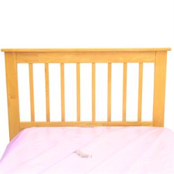 Contemporary light oak trundle bed, slatted headboard and footboard,  incorporating pull-out trundle bed on castors, complete with two memory foam mattresses