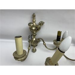 Siz branch silvered chandelier, decorated with acanthus leaves and putti, together with two matching three branch wall sconces, chandelier D65cm