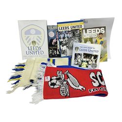 Leeds United scarfs and books, including Leeds United's complete record 1919-1989, The Essential History of Leeds United etc 