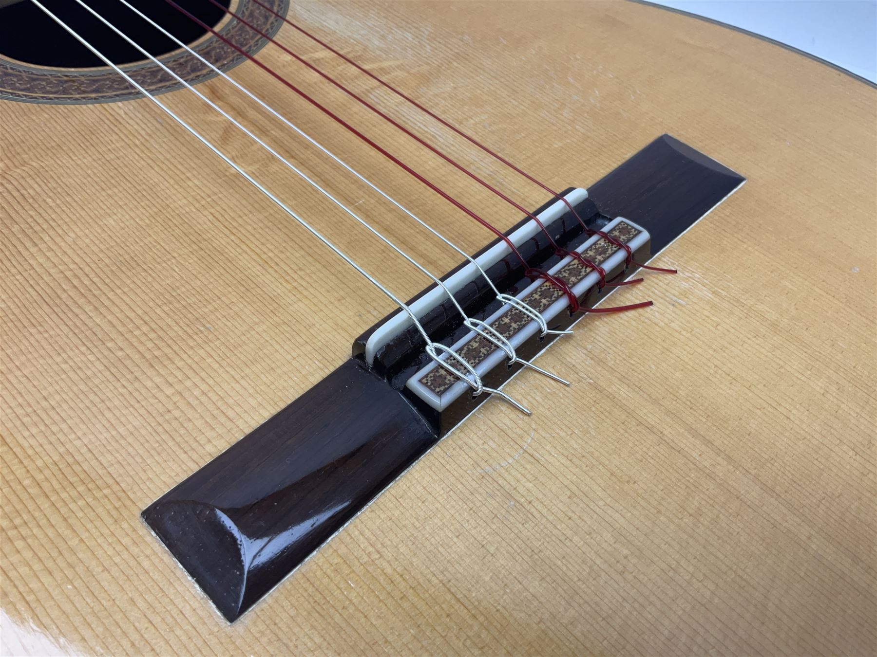 British hand made classical acoustic guitar by Huw Morgan with Indian rosewood back and sides and spruce top; bears label dated May 1998; L100cm; in Tribal Planet lightweight carrying case