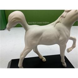 Five Beswick and Royal Doulton horse figures in matt white on black plinths, comprising of  Spirit of Affection no. 2689/2536, Springtime no.2837, Spirit of peace no.2916, Spirit of earth no.2914 and Spirit of the wild no. 183, together with a composite figure of a horse (6)