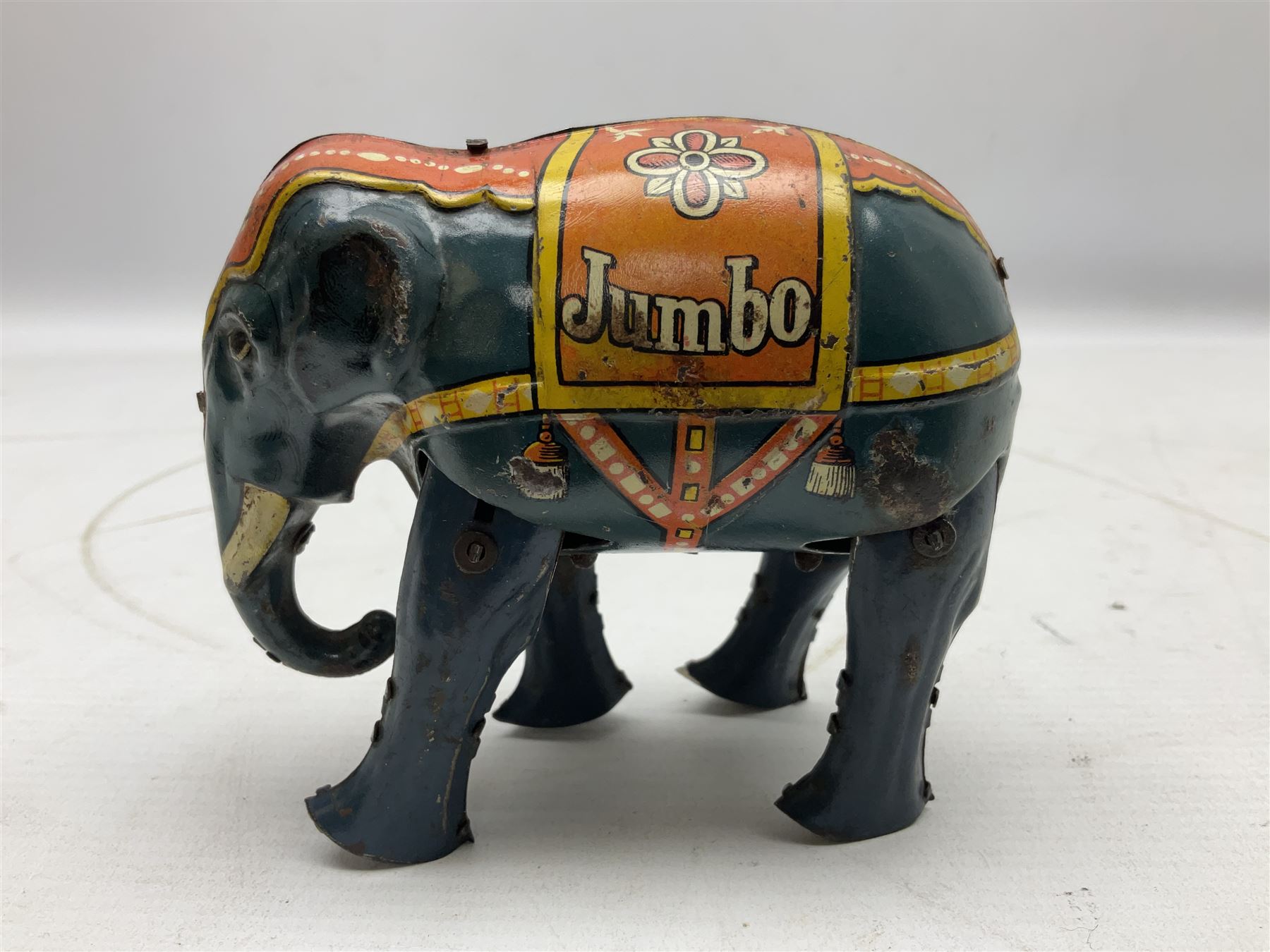 German Blomer and Schuler 'Jumbo' Elephant clockwork tinplate figure, marked 'D.R.P. DRGM Made in Germany', complete with key H9.5cm