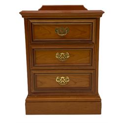 Pair of cherry wood three drawer bedside chests