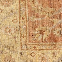 Afghan Ziegler rug, terracotta field with an all-over design of palmettes and stylized foliage in soft beige and gold tones, with a Persian Qum silk prayer rug, with a central tree of life and flowering branches and birds, within multiple floral borders, 88x125cm (2)