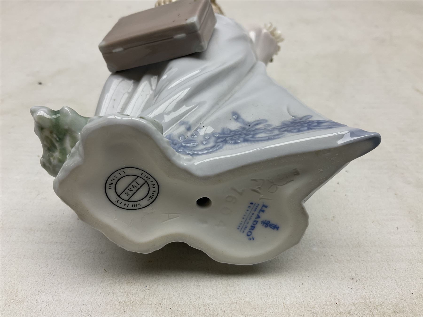 Three Lladro figures comprising, Pocket Full of Wishes no 7650, School Days no 7604 and Spring Bouquets no 7603, all with original boxes, largest example H26cm  