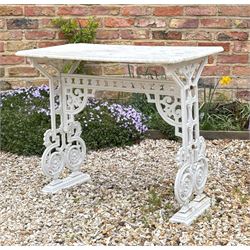 Victorian cast iron garden table with variegated marble top. L127cm, D57cm, H75cm. 