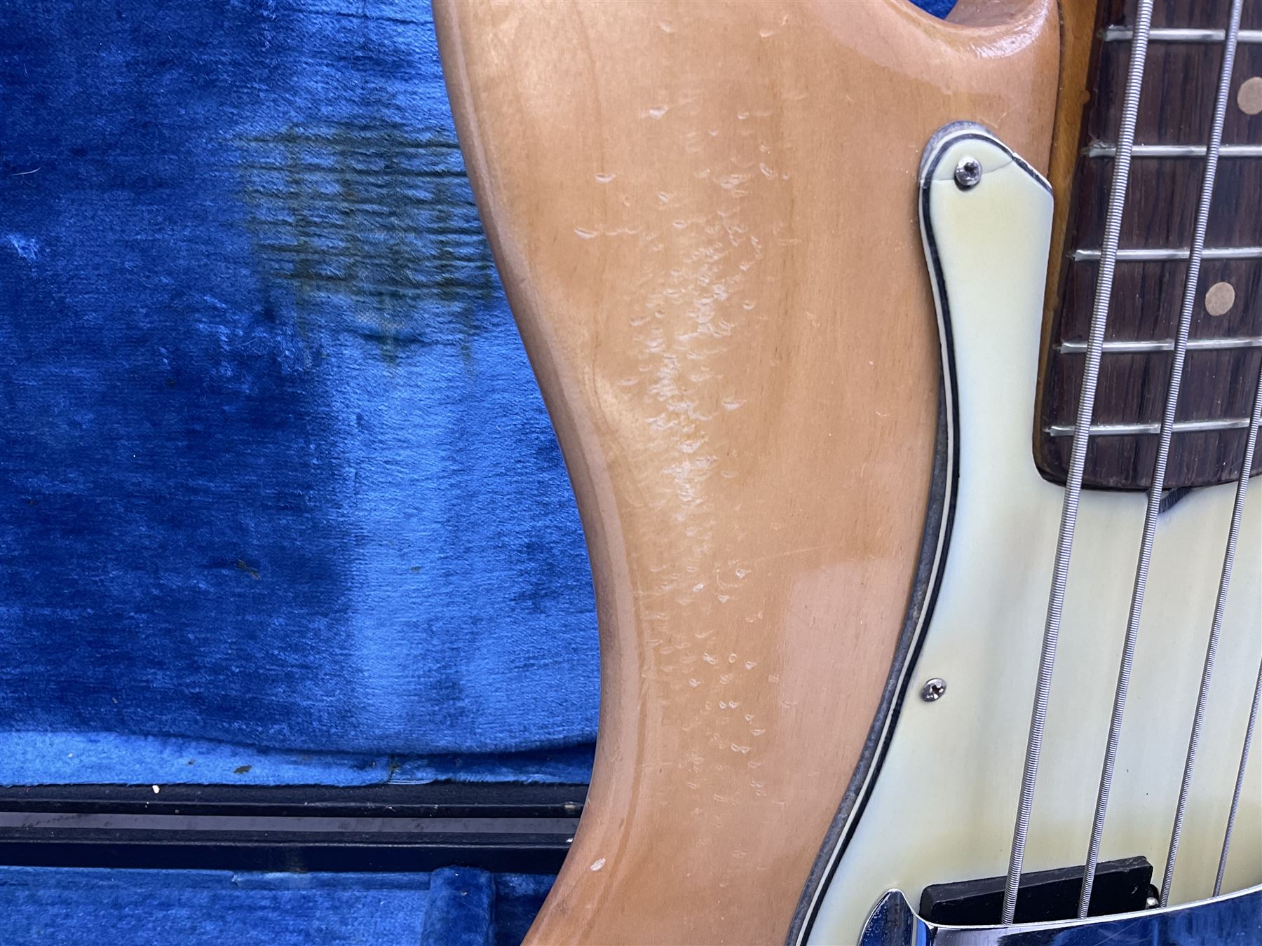 1962 Fender Precision bass guitar; re-finished in natural alder in the 1970s; impressed date code 5NOV62C to end of neck and serial no.90537 to back plate; L115.5cm; in replacement hard carrying case