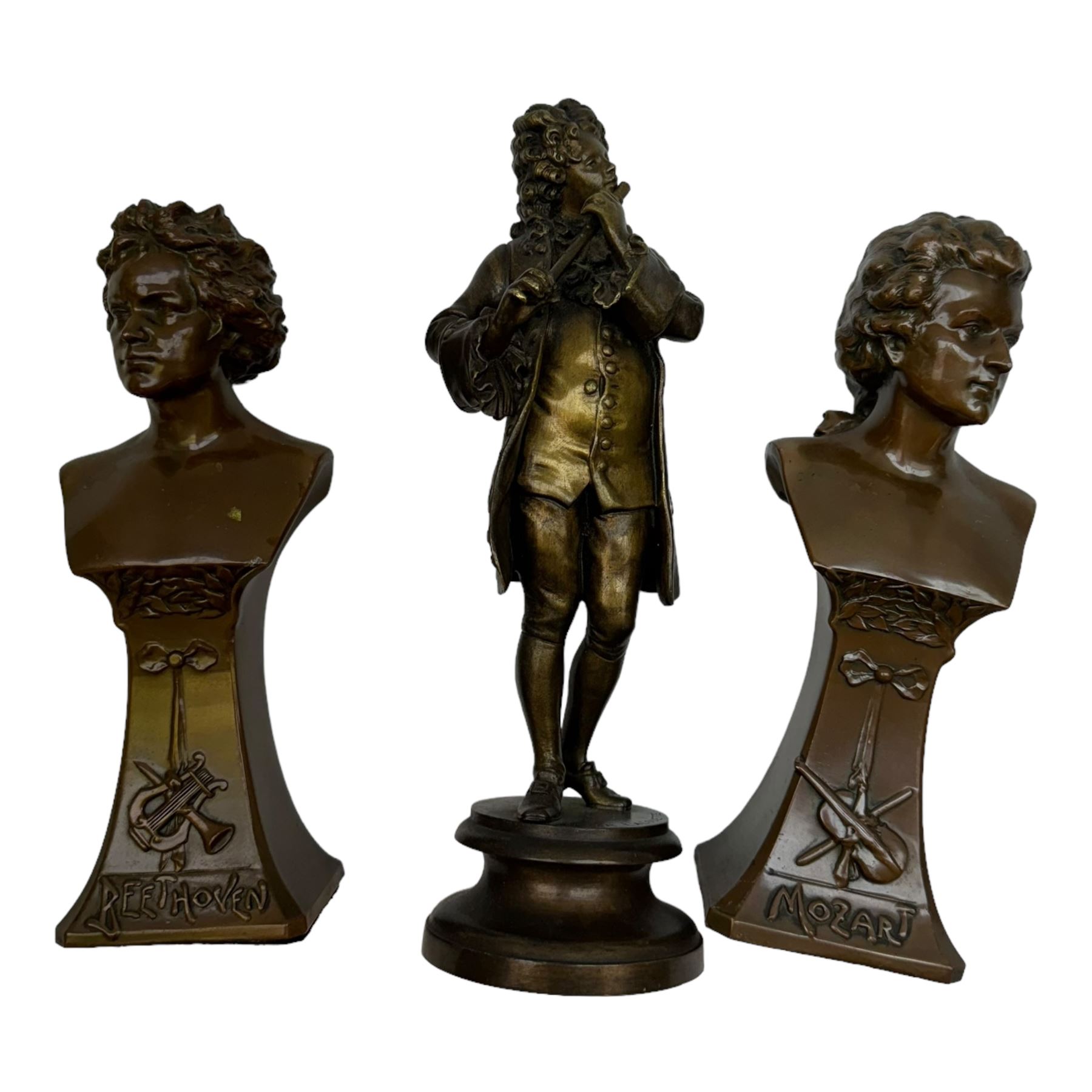 Cast metal figure depicting man in classical dress playing a flute, signed to base Par Lalouette, together with a pair of busts, depicting Beethoven and Mozart, tallest H22cm