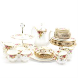 Royal Albert Old Country Roses pattern tea wares, comprising coffee pot, jug and sugar bowl, cake stands, napkin rings, teacups and saucers, side plates, dessert plates, small plates, all with printed marks beneath